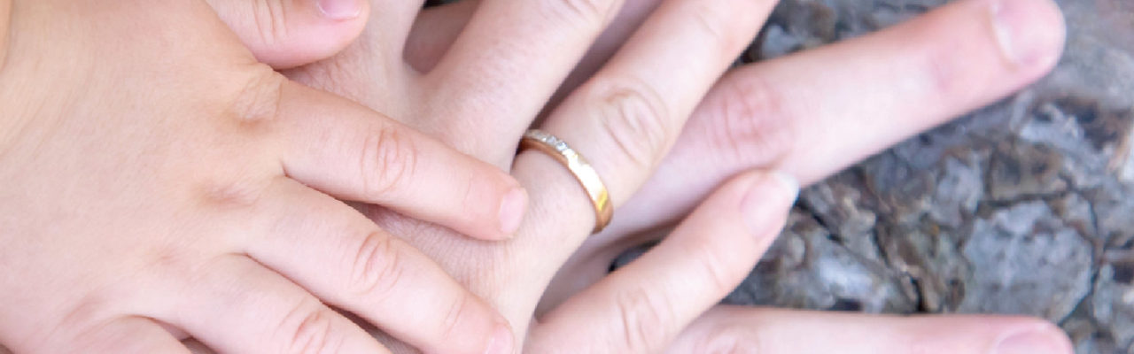 Photo: Child and parents' hands