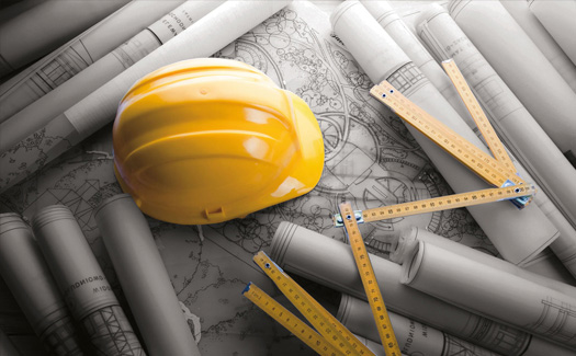 Photo: Hard hat and blueprint