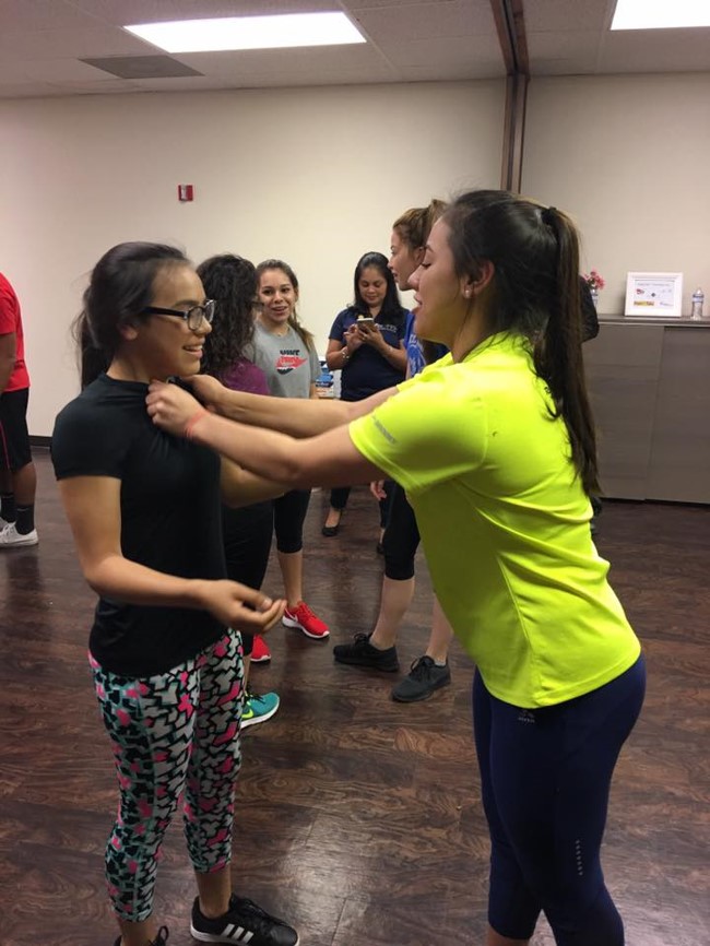 Photo: Assistant Demonstrates Self Defense Techniqus